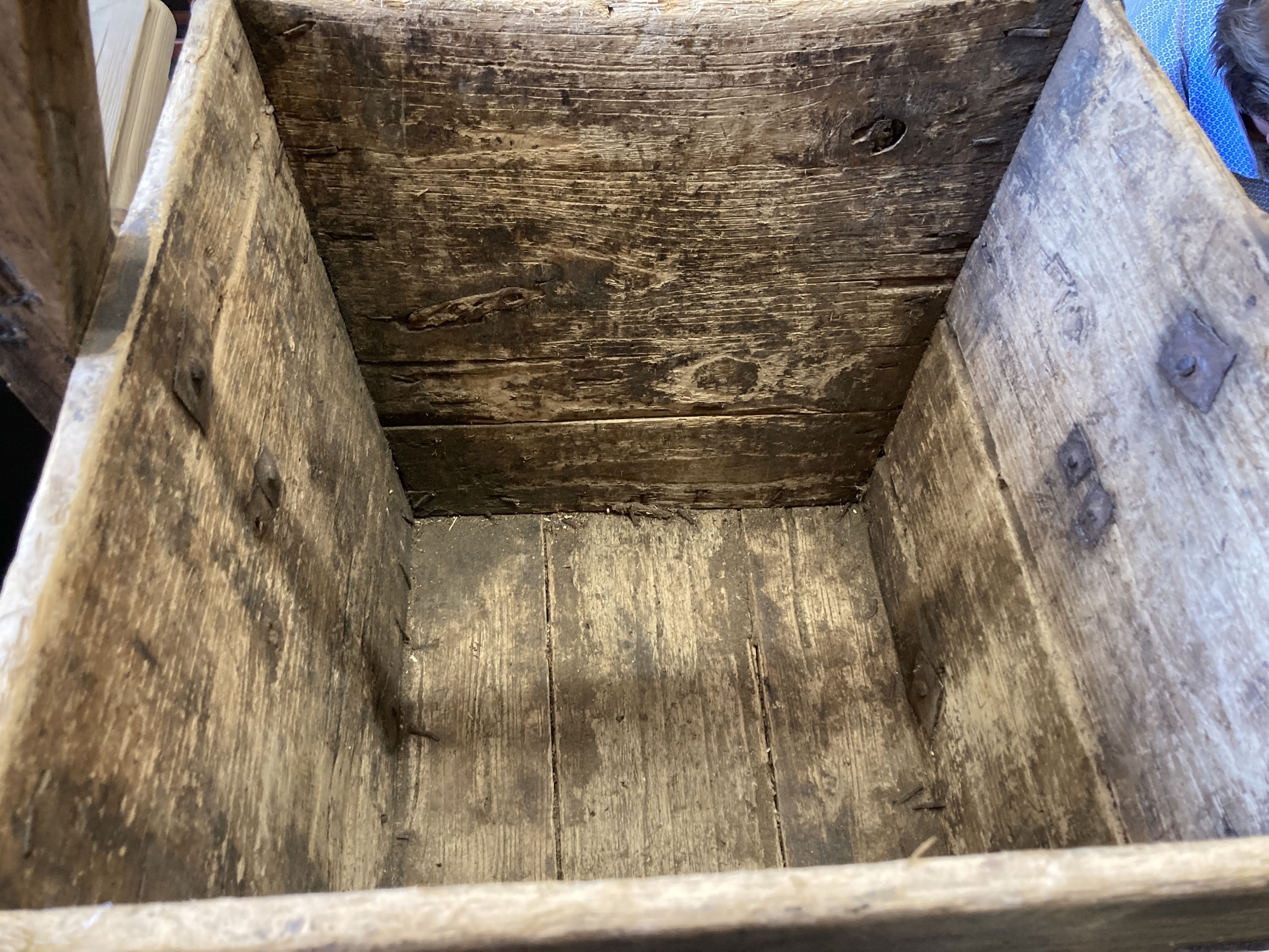 A rectangular provincial oak low table, width 55cm, depth 32cm, height 55cm together with a square Chinese bucket